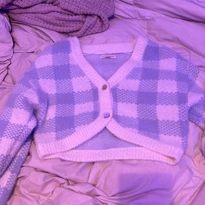 blue and white checkered sweater